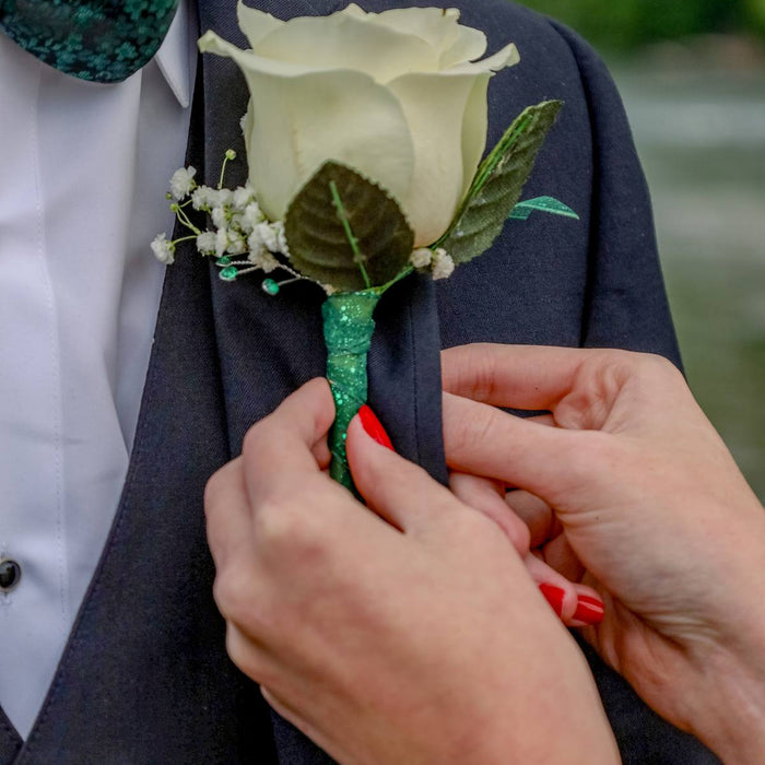 Wedding corsage and buttonhole with white flowers