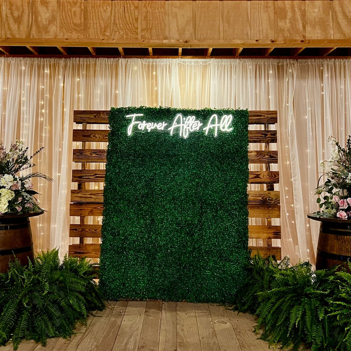 The Perfect Backdrop for Your Big Day: Faux Grass Walls and Corsage Creations